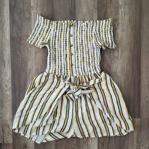 Black , White and Yellow romper. Medium  size